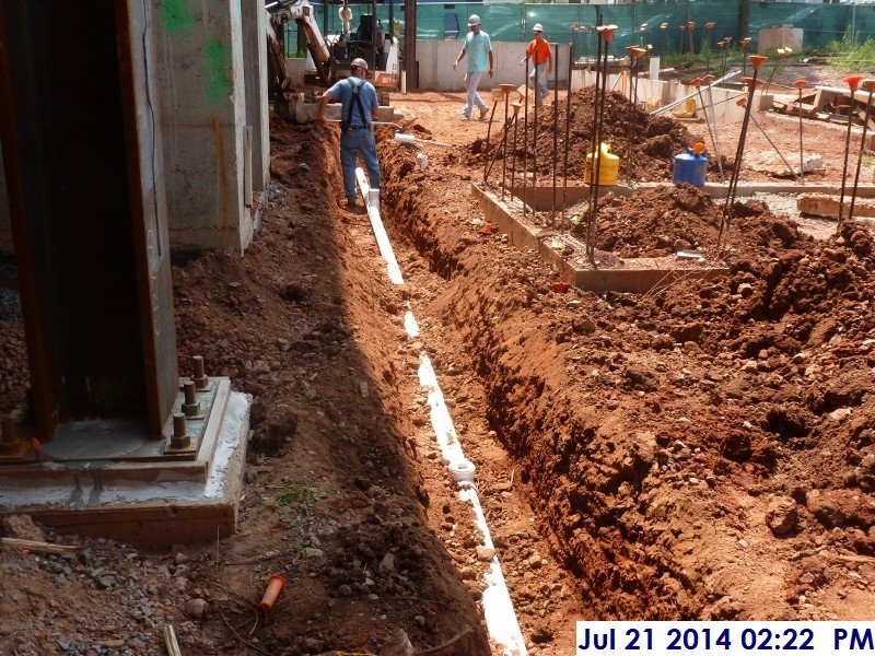 Installing the underground plumbing between column lines 3-3.5 from C-E. Facing West (800x600)